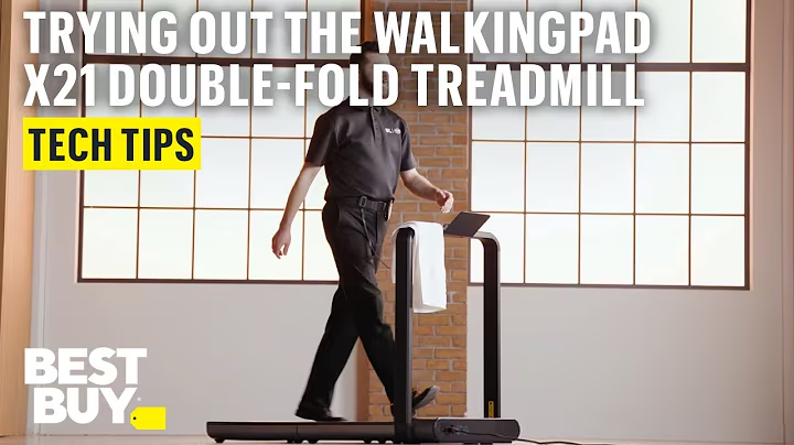 Text reads: "Trying out the Walkingpad X21 Double-Fold Treadmill. Tech Tips. Best Buy." Behind the text, a Geek Squad agent is walking on a treadmill in a room with big windows.